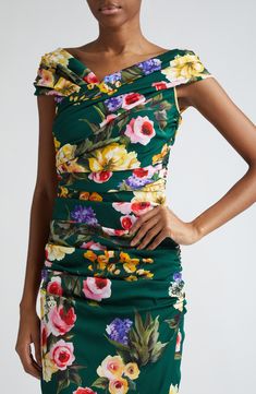 Plucked from the '60s-inspired 'Flower Power' collection, a gorgeous garden vines this sheath dress rooted in the luxury of stretch-kissed silk charmeuse. Hidden back-zip closure Jewel neck Sleeveless Stretch-silk lining 94% silk, 6% spandex Dry clean Made in Italy Designer Clothing Fitted Floral Dress For Garden Party, Green Floral Print Dress With Fitted Bodice, Fitted Floral Print Midi Dress For Garden Party, Green Floral Print Dresses With Fitted Bodice, Green Dresses With Floral Print And Fitted Bodice, Fitted Dress With Ruched Bodice For Garden Party, Green Fitted Dress For Garden Party, Spring Sheath Dress With Ruched Bodice, Green Floral Print Sheath Dress