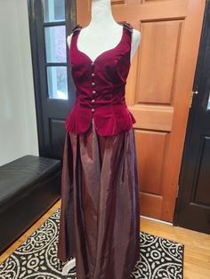 "This is a sweetheart of an 80's dress by Roberts for any special occasion! A beautiful winter burgundy velveteen bodice that is lined and has decorative buttons down front. Sweetheart neckline with bows on the shoulder. The attached skirt is a taffeta style black/burgundy. Zips up the back. There is a small hole near the hem. (see pics) Size 7/8. 100% Rayon. Made in USA Please check measurements- Chest: 36\" Waist: 31\" Length: 53. 5\"" Burgundy Gown, Gig Harbor Wa, Gig Harbor, 80s Dress, Tulle Prom Dress, Decorative Buttons, Dress Clothes For Women, Sweetheart Neckline, Made In Usa