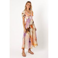 Unleash your inner fashionista in our vibrant, Christoff dress. With its alluring deep V-neckline and keyhole cut-out, you'll be turning heads and making a style statement. The A-line skirt design twirls to your rhythm, while the back shirred panel adds a fetching touch of detail. Summer V-neck Midi Dress With Cutout, Spring Vacation Maxi Dress With Cut-out Waist, Spring Cut-out Waist Dress For Day Out, Spring Maxi Dress With Cut-out Waist For Date Night, Spring Dresses For Day Out With Cut-out Waist, Spring Dresses With Cut-out Waist For Day Out, Spring Midi Dress For Beach With Notched Neckline, Spring V-neck Maxi Dress With Cutout, Spring Midi Dress With Notched Neckline For Beach