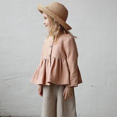 Get ready to turn heads with our Retro Ruffled Solid Blouse! 🌸 Made from a blend of cotton and linen, this blouse is perfect for spring and autumn. The ruffled details add a touch of nostalgia, while the solid pattern exudes timeless charm. Designed for girls aged 1-6 years, it features a comfortable O-neck collar and long sleeves. This regular-length blouse is a must-have addition to your little one's wardrobe. Don't miss out on this stylish piece that combines retro flair with modern comfort! 🌼 Specifications: Material: Cotton, Linen Age Range: 1-6 years Collar: O-Neck Pattern Type: Solid Sleeve Length: Long Season: Spring & Autumn Fit: Fits true to size, take your normal size Gender: Girls Clothing Length: Regular Item Type: Blouse Spring Long Sleeve Tops With Ruffle Hem, Spring Cotton Blouse With Ruffle Sleeves, Spring Solid Color Tops With Ruffle Hem, Solid Color Spring Tops With Ruffle Hem, Spring Ruffled Long Sleeve Top, Spring Long Sleeve Ruffled Tops, Spring Tops With Ruffle Hem And Ruffled Collar, Spring Cotton Blouse With Ruffled Collar, Cotton Tops With Ruffled Collar For Fall