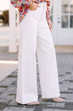 These crisp white, wide leg jeans are so chic and trendy! Not only that, they are perfect for the spring! You are going to love styling these jeans with flowy blouses or even with basic tops. Button/zip front closure Pockets Wide legs Fair stretch Baileigh is wearing the size 1. White Cotton Wide Leg Pants For Day Out, Trendy White High-rise Flare Jeans, Chic White Flare Bottoms, Chic White Flare Pants, Versatile Flare Jeans For Spring, Casual Cream Flare Jeans For Spring, Versatile Spring Flare Jeans For Everyday, Trendy White Flare Bottoms, White Flare Pants For Spring