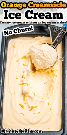 an ice cream scooping in a pan with the words orange creamsice on it