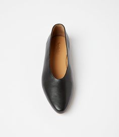 Slip into comfort and style with these versatile black leather ballet flats! Featuring a pointed toe design, these flats are perfect for any occasion. Dress them up or down, these flats are sure to be a staple in your wardrobe. True to size Material: Leather Heel height: 0.25" Imported Seychelles Wipe with soft cloth | Karen Kane Pointed Toe Ballet Flats in Black, Size 9.5, Plain Slip-on Pointed Toe Flats For Business, Office Ballet Flats Slip-on Almond Toe, Office Slip-on Ballet Flats With Almond Toe, Office Ballet Flats With Almond Toe, Pointed Toe Flats For Work With Branded Insole, Office-appropriate Almond Toe Ballet Flats With Slip-on Fit, Office Slip-on Ballet Flats, Business Slip-on Pointed Toe Flats, Slip-on Ballet Flats For Work