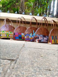 10 pieces of Ankara leather made Handbags. They will made from different Ankara fabric material. This bags will contain a free shipping guarantee via DHL EXPRESS  shipping takes 4-6 days after the day of dispatch. Multicolor Leather Satchel Box Bag, Multicolor Leather Box Bag With Top Handle, Traditional Top Handle Bag With Leather Handles, Traditional Brown Shopping Bag, Traditional Satchel Bag With Leather Handles, Multicolor Leather Bag With Top Carry Handle, Multicolor Leather Tote Box Bag, Traditional Bags With Multicolor Leather Handles, Traditional Leather Bag With Top Handle