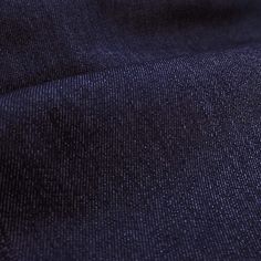 the fabric is dark blue and has small dots on it