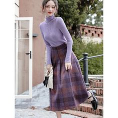 A set of a bright wisteria purple plaid retro skirt and turtleneck sweater that resembles a wisteria flower. The skirt has a high waist and flared silhouette. Turtleneck sweaters have a relatively slim design. An item with a slightly retro feel. 
 
 What is included in your order 
 
 Skirt 
 Turtleneck sweater 
 
 
 Size 
 
 S size 
 
 Skirt 
 
 Total length: 78cm 
 Waist: 64cm 
 
 Turtleneck sweater 
 
 Length: 45cm 
 Bust: 78cm 
 
 
 M size 
 
 Skirt 
 
 Total length: 79cm 
 Waist: 68cm 
 
 Tu Wisteria Purple, Wisteria Flower, Turtleneck Sweaters, Retro Skirt, Purple Plaid, Wisteria, Slim Design, Turtleneck Sweater, Sweater Sizes