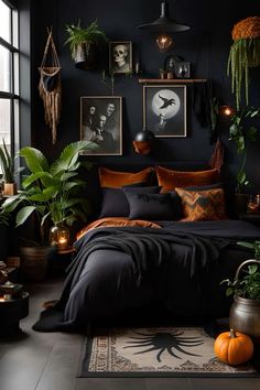 a bedroom with black walls and lots of plants