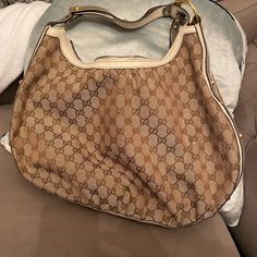 Gorgeous Vintage Authentic Gucci Hobo Bag! White And Grey Leather With Gold Studs And Classic Gg Brown Canvas On Both Sides. Measures Approximately 15” Wide And 10” Tall, Plus Strap. Great Shoulder Bag! The Only Flaw Is The Buckle On The Left Of The Bag Is Missing (Last Picture) - Was Repaired By A Cobbler And Isn’t Noticeable At All When Wearing!! Otherwise In Perfect Condition - Barely Used. Gucci Hobo Bag Vintage, Gucci Hobo Bag, Christian Louboutin Pigalle Follies, Pigalle Follies, Large Hobo Bag, Gucci Purse, Red Louboutin, Gucci Monogram, Gucci Bamboo