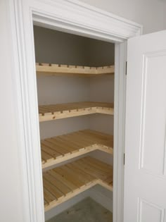 empty shelves in the corner of a room