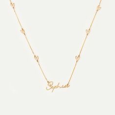 Custom Heart Name 14K Gold Station Necklace Dazzle her day with the Custom Heart Name Necklace in 14K Solid Gold. This personalized piece showcases the perfect blend of style and sentiment, making it an extraordinary gift for any woman. Its unique heart name station design offers an appealing way to exhibit one's individuality, perfect for everyday wear or special occasions. You'll have: 14k solid gold handcrafted necklace 100% ethical sourced jewelry Size Material: 14k Solid Gold Pendant Size: Elegant Custom Name Heart Necklace For Anniversary, Personalized 14k Gold Heart Necklace Fine Jewelry, Elegant Heart-shaped Name Jewelry, Elegant Heart-shaped Jewelry With Names, Personalized Double Heart Necklace In 14k Gold, Personalized 14k Gold Double Heart Necklace, Personalized Double Heart 14k Gold Necklace, Valentine's Day Yellow Gold Name Necklace With Heart Charm, 14k Gold Name Necklace For Valentine's Day