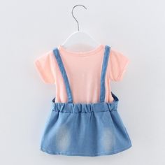 Fitted Cotton Pinafore Dress For Summer, Summer Cotton Fitted Pinafore Dress, Cute Short Sleeve Denim Dress, Cute Cotton Suspender Dress For Summer, Cute Blue Denim Summer Dress, Cute Cotton Pinafore Dress For Summer, Sleeveless Pink Denim Dress, Casual Pink Pinafore Dress For Spring, Spring Pink Denim Dress