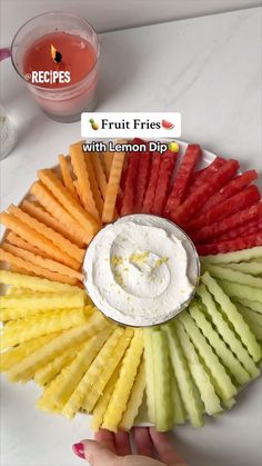 the fruit fries with lemon dip are arranged in a circle on top of a white plate