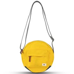 PRICES MAY VARY. Take On Your Day with Confidence: The Paddington is the perfect circle crossbody bag or over shoulder purse to bring on your travels. Whatever the weather, this small over the shoulder purse made with weatherproof nylon and durable hardware can withstand daily use. Sort Your Essentials: Organize your daily needs in this round bag designed with front and inner pockets, chunky zippers, and a wide mouth. Our 9x9x2.8” small bags for women and men can fit your phone, keys, wallet, an Cheap Functional Yellow Shoulder Bag, Everyday Yellow Crossbody Bag, Cross Bags For Women, Portable Yellow Crossbody Shoulder Bag, Small Bags For Women, Yellow Crossbody Shoulder Bag With Removable Pouch, Modern Yellow Crossbody Shoulder Bag, Over The Shoulder Purse, Nylon Crossbody Bag