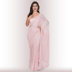 Are you ready to shine? Elevate your style with our Ready-Made Sequin Saree in the enchanting Blush shade. Crafted from high-quality georgette fabric adorned with mesmerizing sequin work, this saree promises a lavish and effortless style upgrade. It effortlessly drapes in less than a minute, ensuring you're ready to dazzle in no time! 🤩😍💃With its exquisite design and easy-to-wear nature, this Ready-Made Sequin Saree makes a statement without the need for elaborate draping or styling. The sequ Elegant Pink Pre-draped Saree For Formal Occasions, Elegant Pink Saree For Evening, Elegant Pink Evening Saree, Pink Georgette Saree For Evening, Pink Georgette Saree For Formal Occasions, Glamorous Georgette Blouse Piece, Formal Pink Georgette Saree, Elegant Chiffon Evening Blouse Piece, Elegant Pink Georgette Blouse Piece