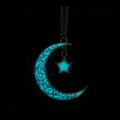 A beautiful necklace during the day and an enchanting one at night!  This antique silver moon and star pendant was intricately infused with pigments that glow in the dark after being charged with a light source. It can be charged repeatedly. The pendant is approximately 1 1/2 inches in length. The Moon And Star Pendant, Moon And Star Necklace, Glow Jewelry, Star Necklace Silver, Dark Moon, Moon And Star, Silver Moon, During The Day, Star Pendant