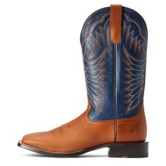 Our Circuit Fargo stands out from the competition, thanks to its 13-inch height and bold blue shaft. Not just a great-looking boot, it cushions your foot from heel to toe with TekStep for maximum comfort whether you're riding or roping. \n\t\tCircuit Fargo Western Boot | Men's Circuit Fargo Western Boots in El Caramelo, Size: 8 D / Medium by Ariat Blue Leather Boots With Reinforced Toe, Blue Snip Toe Boots With Reinforced Heel, Classic Blue Boots With Round Toe, Classic Blue Round Toe Boots, Square Toe Cowboy Boots, Western Embroidery, Boot Stand, Leather Cowboy Boots, Western Boot