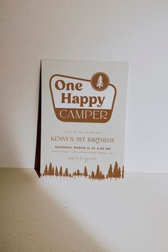 a birthday card with the words one happy camper on it