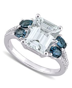 A gorgeous emerald-cut aquamarine is flanked by stunning blue topaz shoulder stones on this beautiful ring with diamond accent detail, from Delmar. Classic White Sapphire Gemstone Ring, Macy's White Round Cut Rings, Macy's White Round Rings, Macy's White Formal Rings, Classic White Sapphire Ring With Accent Stones, Macy's White Brilliant Cut Diamond Ring, Macy's White Brilliant Cut Rings, Macy's White Fine Jewelry Ring, Luxury White Sapphire Ring With Accent Stones