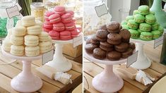 there are many different types of pastries on the trays at this table, including macaroons and cookies