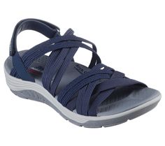 Ease back with style and summery comfort in Skechers Reggae Cup - Simply Biased. This strappy sandal features a Stretch Fit woven fabric upper with an adjustable sling back closure, Arch Comfort comfort footbed and a supportive Reggae midsole. Navy Outdoor Sandals With Cushioned Footbed, Navy Cushioned Sandals For Outdoor, Strappy Sport Sandals With Arch Support For Summer, Summer Strappy Sport Sandals With Arch Support, Navy Cushioned Sandals For Summer, Navy Sporty Sandals With Cushioned Footbed, Sporty Navy Sandals With Cushioned Footbed, Navy Sandals With Removable Insole For Summer, Navy Sandals For Summer Beach Season