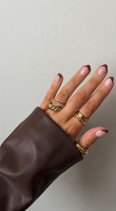 Looking for short fall nail designs that are super cute and perfect for autumn? This post shows you 27 beautiful short fall nails ideas! Trending Fall Nails 2022 Almond, Cute Short Acrylic Nails Burgandy, Brown Tips Nails Short, Nail Color For Rust Dress, Fall Aesthetic Nails Short, Brown French Tip Nails Almond Short, Tabitha Swatosh Nails, Oval Nails One Color, Edgy Neutral Nails