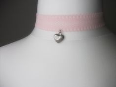 dainty baby pink choker with a heart engraved heart charm ♡ attatched to baby pink ribbon  international shipping is set to standard, you can upgrade at checkout! ♡ Pink Adjustable Choker As A Gift, Adjustable Wedding Choker For Valentine's Day, Pink Choker For Valentine's Day Gift, Adjustable Pink Trendy Choker, Pink Adjustable Trendy Choker, Pink Trendy Adjustable Choker, Adjustable Pink Heart-shaped Necklaces, Adjustable Pink Heart Necklaces, Pink Adjustable Heart-shaped Necklace