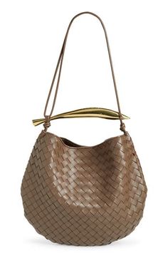 A sardine-inspired sculptural handle brings an artisanal touch to this hobo bag crafted of lambskin leather in the label's signature intrecciato weave. Magnetic closure Top carry handle; crossbody strap Unlined Leather Made in Italy Designer Handbags High-end Handheld Shoulder Bag With Leather Handles, Elegant Brown Hobo Bag With Woven Leather, Gold Hobo Bag With Detachable Handle For Formal Occasions, Formal Gold Hobo Bag With Detachable Handle, Luxury Handheld Hobo Bag, Luxury Handheld Hobo Bag For Office, Luxury Handheld Bucket Bag For Office, Formal Rectangular Shoulder Bag With Woven Leather, Formal Rectangular Woven Leather Shoulder Bag