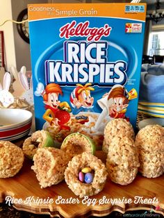 rice krispies are on a wooden tray next to a box of cereal