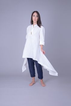 "ITEM DETAILS Oversized, wide collared placket shirt made of high quality linen. Light and easy to wear, this shirt will bring you comfort and fresh feeling in your daily casual routine or smarter occasions. MATERIAL Linen CARE INSTRUCTIONS: Machine cold wash 40 Degree If you have any questions about the item or have any personal requirements about the garment, please do not hesitate to send us a message, our team is available 24/7, or check out our shop policy. -> https://www.etsy.com/shop/F Tops For Women Summer, Tunic Tops For Women, White Linen Top, Asymmetrical Hem Top, Linen Tunic Dress, White Linen Shirt, Cozy Coats, Summer Linen Dresses, Fresh Feeling