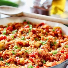 a casserole dish with meat and vegetables in it, ready to be eaten