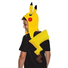 a young boy wearing a pikachu costume