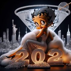 a woman sitting on top of a table in front of a martini glass with the numbers 2012