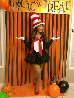 a woman dressed as the cat in the hat