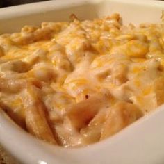 macaroni and cheese casserole in a white dish