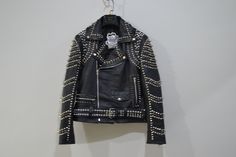 ♣ Product Description:    We have brought you this stylish Handmade Studded Punk Jacket made with the genuine best quality of Leather. This Men's Studded leather Jacket has been inspired by Heavy metal fashion wears and is designed for Motorcycle bikers and Rockstars. This Studded Punk Jacket has cool studs that gives it the killer looks. Having asymmetrical Brando zipper closure gives it incredibly astonishing feel. Buy this Men's Studded Leather Jacket for yourself and get commendations by your fellows.  When you look at this jacket, all you can think of is a rockstar. This is precisely what this biker black studded leather jacket is all about. If there is one thing we can say about this jacket, it is that this is definitely for the faint of heart. This flashy number is as majestic as it Punk Leather Jacket For Alternative Fashion, Gothic Studded Biker Jacket For Biker Events, Gothic Studded Biker Jacket For Events, Studded Fitted Leather Jacket For Biker Events, Fitted Studded Leather Jacket For Biker Events, Fitted Leather Biker Jacket For Alternative Fashion, Fitted Studded Edgy Biker Jacket, Edgy Fitted Studded Biker Jacket, Fitted Studs Biker Jacket