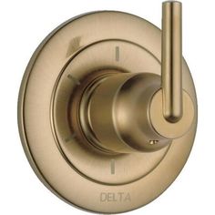 the delta shower faucet is shown in brushed brass