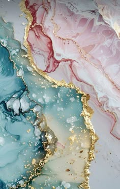 an abstract painting with blue, pink and gold paint on it's surface is featured in this image