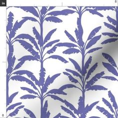 a blue and white wallpaper with leaves on it's back drop in the background