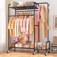 an iron rack with clothes and shoes on it