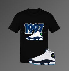 This t-shirt inspired by the Jordan 13 Retro 'Obsidian' colorway is everything you've dreamed of and more. It feels soft and lightweight, with the right amount of stretch. It's comfortable and flattering for both men and women. This Jordan inspired design is perfect for sneakerheads everywhere!  * 100% combed and ring-spun cotton (Heather colors contain polyester) * Ash color is 99% combed and ring-spun cotton, 1% polyester * Heather colors are 52% combed and ring-spun cotton, 48% polyester * At Sporty Streetwear Shirt With Sublimation Print, Black T-shirt With Screen Print For Sneaker Matching, Throwback Blue T-shirt For Streetwear, Throwback Logo Print T-shirt For Streetwear, Throwback Streetwear T-shirt With Logo Print, Black Short Sleeve Throwback T-shirt, Throwback T-shirt With Logo Print For Streetwear, Black Throwback T-shirt With Letter Print, Throwback Black T-shirt With Letter Print