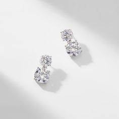 ABOUT THE PRODUCTDouble round CZ stones create an elegant drop on these modern, simple yet... Elegant Wedding Jewelry, Diamond Earrings Wedding, Wedding Earrings Studs, Round Diamond Earrings, Diamond Earrings Design, Jewelry Drawing, Bride Earrings, Cz Stud Earrings, Diamond Drops