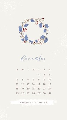 a calendar with the word december written in blue and red flowers on it, next to a