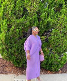 Our Lavender Tea Dress is the epitome of timeless elegance. Cut in a sophisticated silhouette, it features a V-neck and statement batwing sleeves that flutter gracefully as you move. Perfect for any occasion, the delicate lavender hue adds a pop of gorgeous color that is sure to delight the eye. Style it with heels or flats to create an effortless, yet timeless look-it's the perfect dress for any occasion. PRE ORDER, SHIPS IN 14 BUSINESS DAYS. One size, fits sizes S-XXL This dress has great stre Chic Lavender V-neck Midi Dress, Casual Lavender V-neck Maxi Dress, Purple V-neck Dress With Relaxed Fit, Lavender V-neck Bohemian Maxi Dress, Bohemian Lavender V-neck Maxi Dress, Lavender Tea, Gold Dress, Bat Wings, Batwing Sleeve