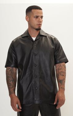 Short Sleeve Leather Shirt Jacket - Black - Ron Tomson Black Leather Button-up Top, Black Leather Collared Top, Classic Black Single Breasted Top, Classic Black Single-breasted Top, Fitted Leather Button-up Top, Modern Leather Tops For Workwear, Sleek Leather Tops For Workwear, Sleek Leather Tops For Work, Luxury Black Tops With Button Closure