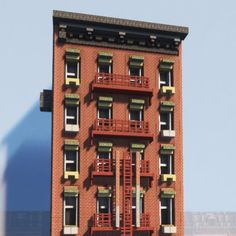 a tall brick building with balconies and windows