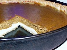 there is a pie in the pan on the table