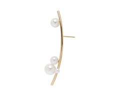 With a flourish of whimsical elegance and modern simplicity, this single Sophie Bille Brahe earring has a fluid, sculptural presence. Meant for the right lobe, the 14K yellow gold earring curves outward and is set with round, white freshwater pearls at its top and bottom. Statement-making no matter what earring you wear on the other side.14K yellow gold and pearl earring : 2 1/16" x 1/2"freshwater pearls : vary : 3mm diameter to 9mm diameter each14K yellow gold post backs*price is for SINGLE ear Daniela Villegas, Digby And Iona, Rebecca Overmann, Sophie Bille Brahe, Pearl Earring, Single Stone, White Freshwater Pearl, Gold Earring, Yellow Gold Earring