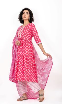 This cotton Anarkali suit has 3/4th sleeves and a combination of prints. It comes with a printed Dupatta and straight-printed pants. Offered in four different sizes from M to XL About Pironah Discover Pironah, your go-to for Indo-Ethnic and Fusion Wear on Etsy! 🌟 From Silk Suits to Anarkalis, trendy Co-ord Sets, and many more, our curated collection blends tradition and contemporary style. Shop exclusively at https://www.pironah.com for FREE 30-day exchanges and easy returns. Elevate your wardrobe with Pironah's unique fusion of elegance and trendsetting fashion! Website Visit us at www.pironah.com and explore hundreds of eye-catching designs and collections to dresses to suit every occasion. Pink Cotton Salwar Kameez With Block Print, Pink Kalamkari Print Straight Kurta Salwar Kameez, Pink Straight Kurta Salwar Kameez With Kalamkari Print, Pink Kalamkari Print Straight Salwar Kameez, Cotton Printed Pink Salwar Kameez, Pink Cotton Printed Salwar Kameez, Pink Cotton Salwar Kameez Printed, Traditional Printed Pink Salwar Kameez, Printed Cotton Traditional Wear For Diwali