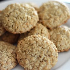 a white plate topped with oatmeal cookies