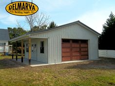 a garage with a sign that says delmarva on the front and side of it